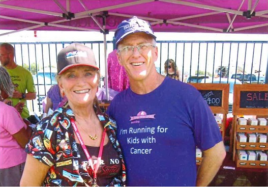 Carla and a friend, working at the Houston Hot Sauce Festival, a fundraising event for the Snowdrop Foundation, Inc.