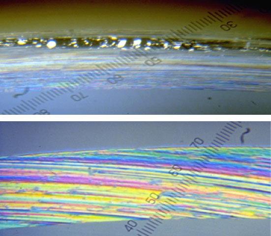 These photos were taken as a part of Kalsi’s research and show the dynamic interfaces of two rotary shaft seals operating with differential pressure. The color spectrum represents lubricant film thicknesses. The seal at the top was concentrically mounted, and experienced direct rubbing, friction, and wear within the black zone. The seal at the bottom was eccentrically mounted, and experienced hydrodynamic interfacial lubrication (as represented by the color spectrum), which prevented dry rubbing, and reduced friction and wear. 