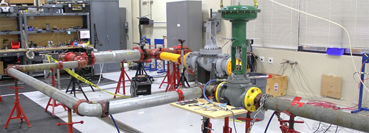 Pressure balanced globe valve, flow loop testing, cavitation, trim characteristics, air-operated actuator