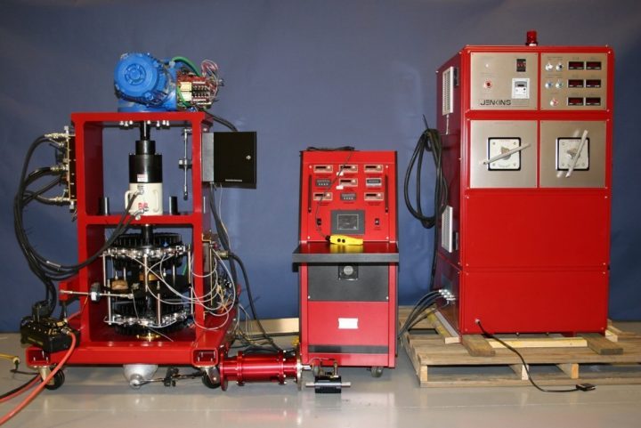 Figure 1 Torque and Thrust Test Bench (left), Control Cabinet (center), and Power Supply Cabinet (right)