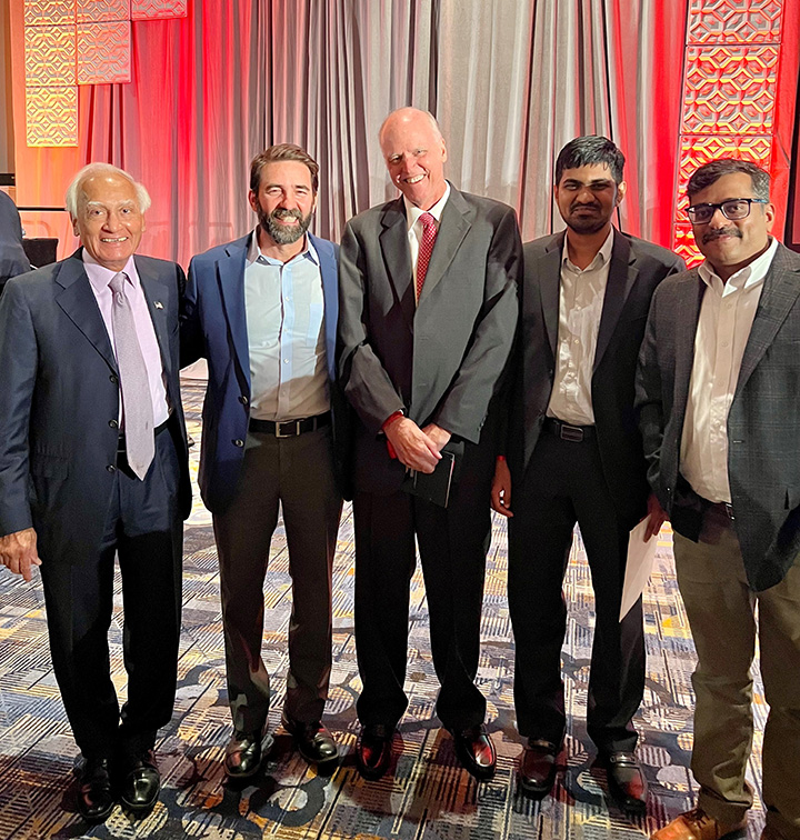 In this photo, Dr. Metcalfe is surrounded by Dr. Kalsi, Aaron Richie, Sai Prabhath Katchi, and Mital Mistry.